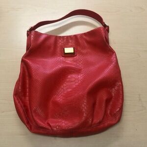 Marc by marc Jacobs orange leather hobo bag.